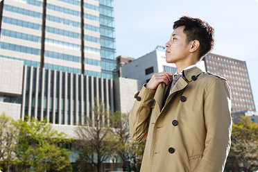 A man in a coat and the exterior of BISSE